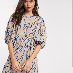 VeroModa skater dress w/ puff sleeves & lace back detail in nude abstract print